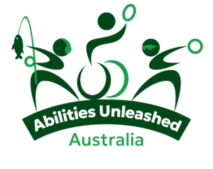 Logo for Abilities Unleashed Australia. The design features three stylised human figures in dark and light green shades, each engaging in different activities: one holding a fishing rod, one in a wheelchair holding a ring overhead, and one with swim goggles also holding a ring. Below the figures is a dark green curved banner with the words “Abilities Unleashed” in bold white text, and the word “Australia” underneath in green. The logo visually represents inclusive sport and recreation.