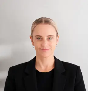 Headshot of Kristy smiling at the camera